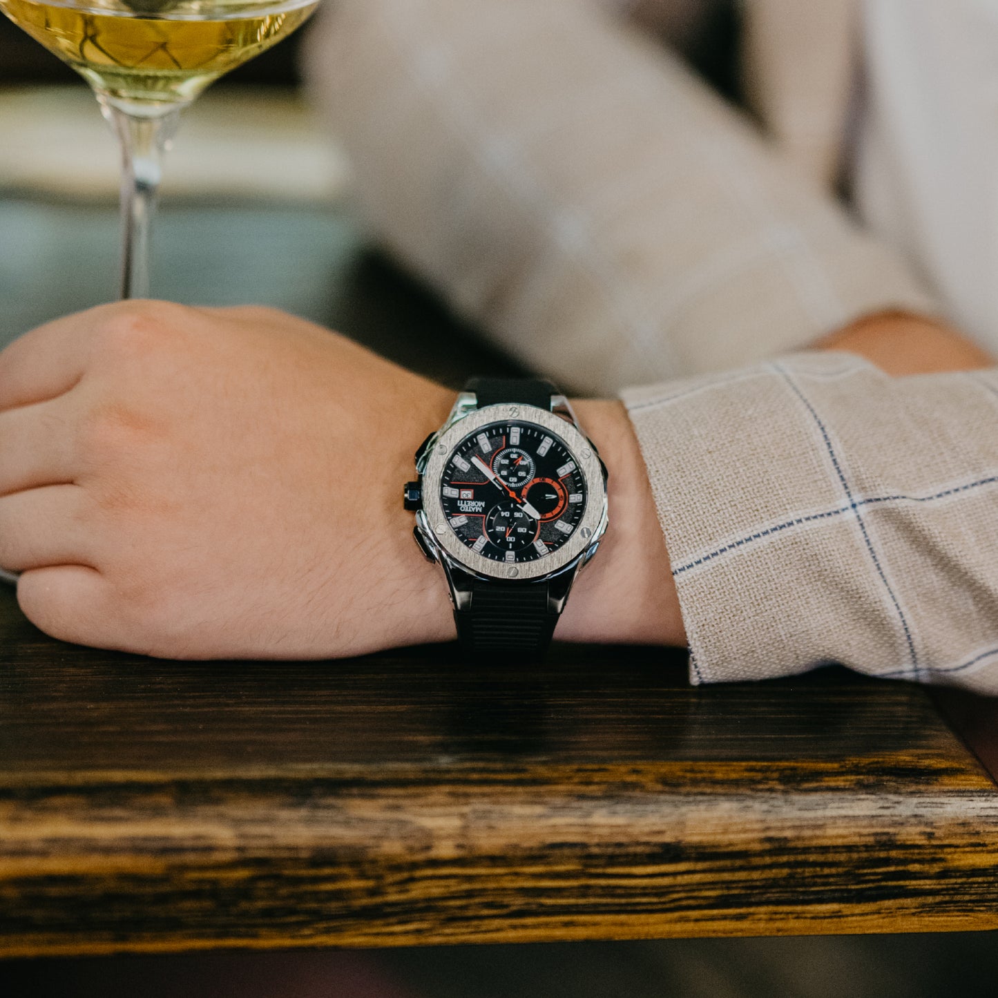 Lifestyle photo of Mateo Moretti Sillaro Argento luxury chronograph men’s watch with silver case and black strap – elegant wrist style