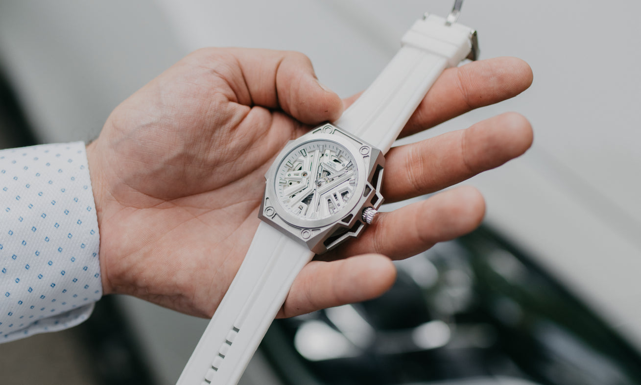 Mateo Moretti Chienti watch held in hand – stainless steel case with skeleton dial