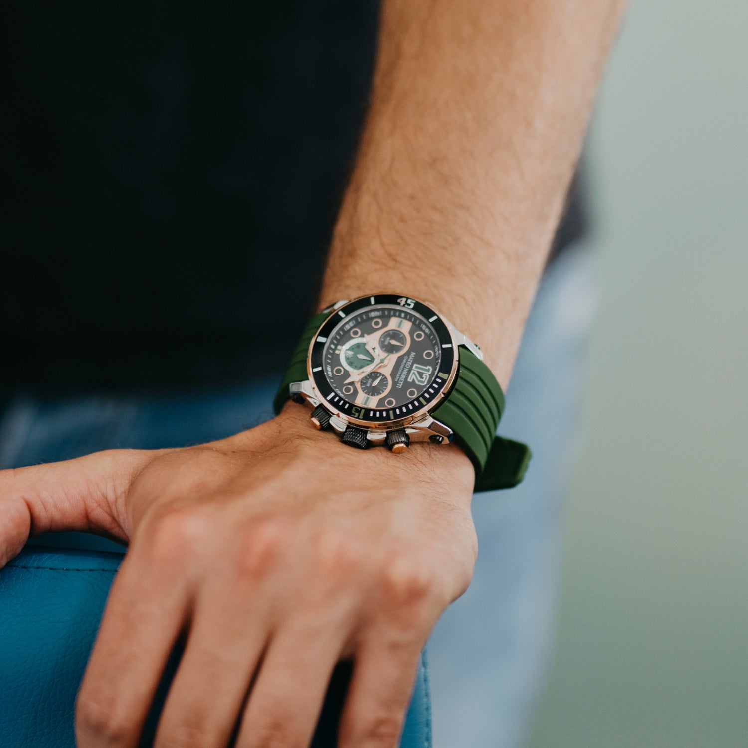 Mateo Moretti Natisone Sillaro men’s watch with green rubber strap and skeleton dial on wrist